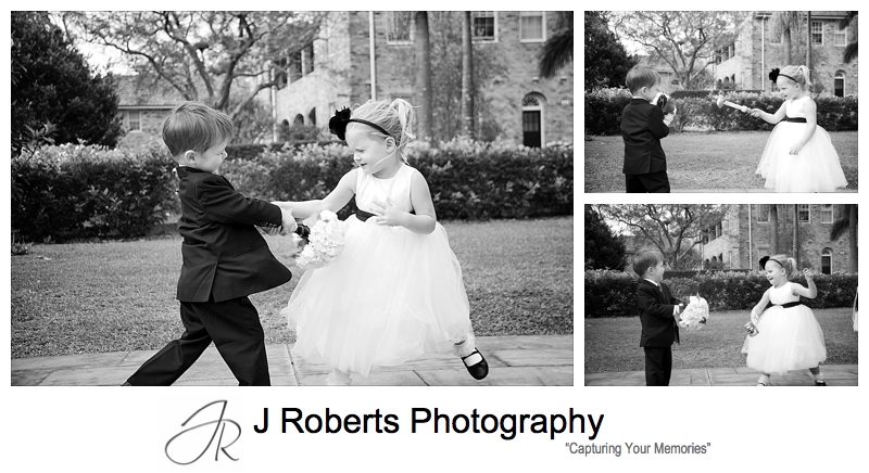 Flower girl and paige boy sword play outside church - wedding photography sydney